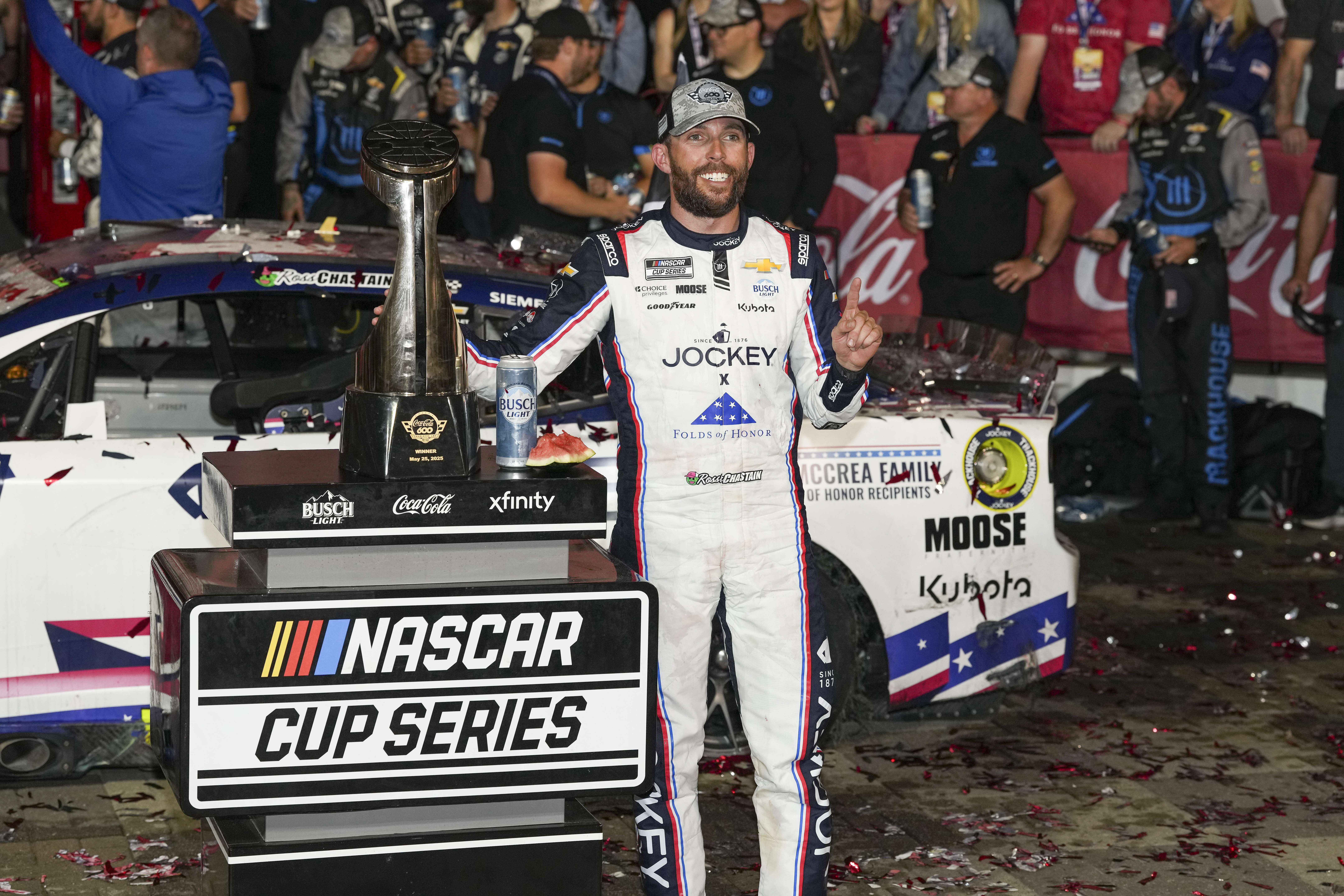 Ross Chastain (1) celebrates his win during the Coca Cola 600 at Charlotte Motor Speedway. - Source: Imagn